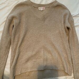 tan sweater